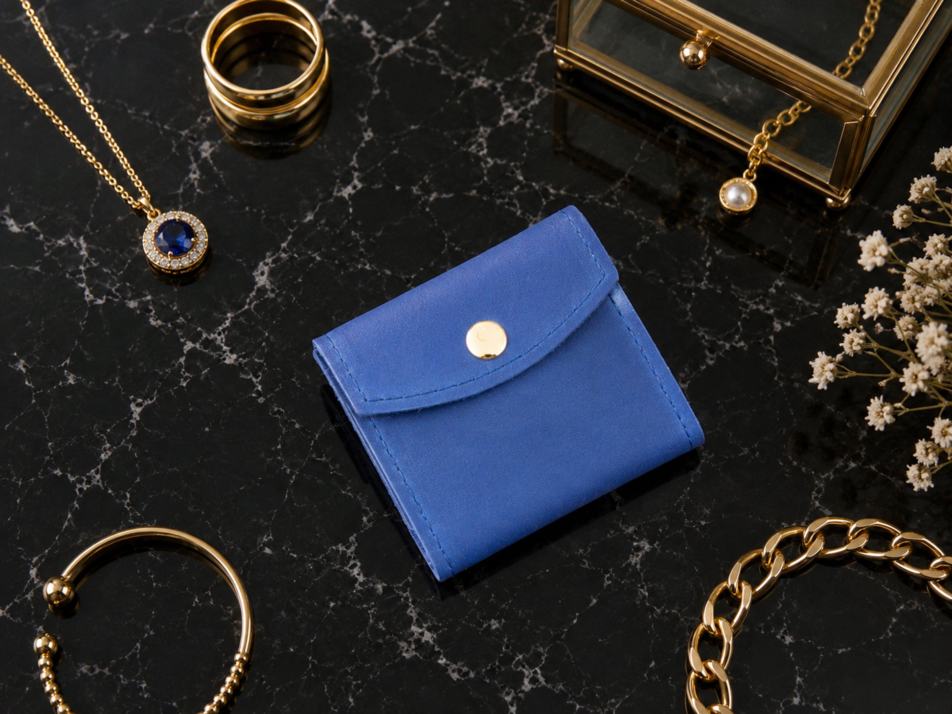 Leather jewelry pouch strap and closure detail, durable brass hardware