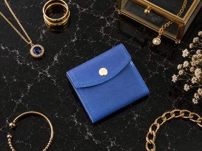 Leather jewelry pouch strap and closure detail, durable brass hardware
