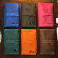 Interior of leather cable organizer, organized pockets for cords and tech