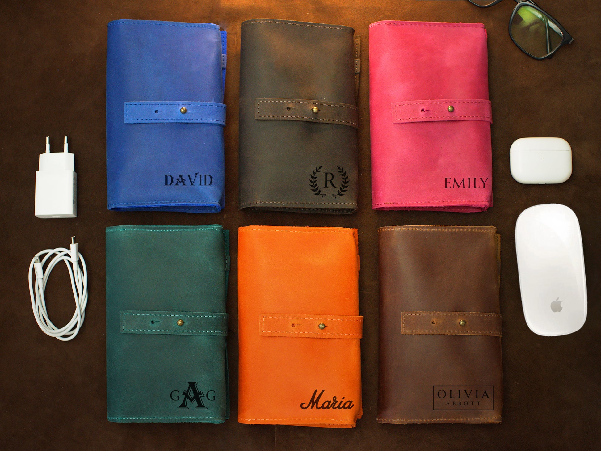Interior of leather cable organizer, organized pockets for cords and tech