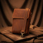 Leather crossbody bag zipper and closure detail, durable brass hardware