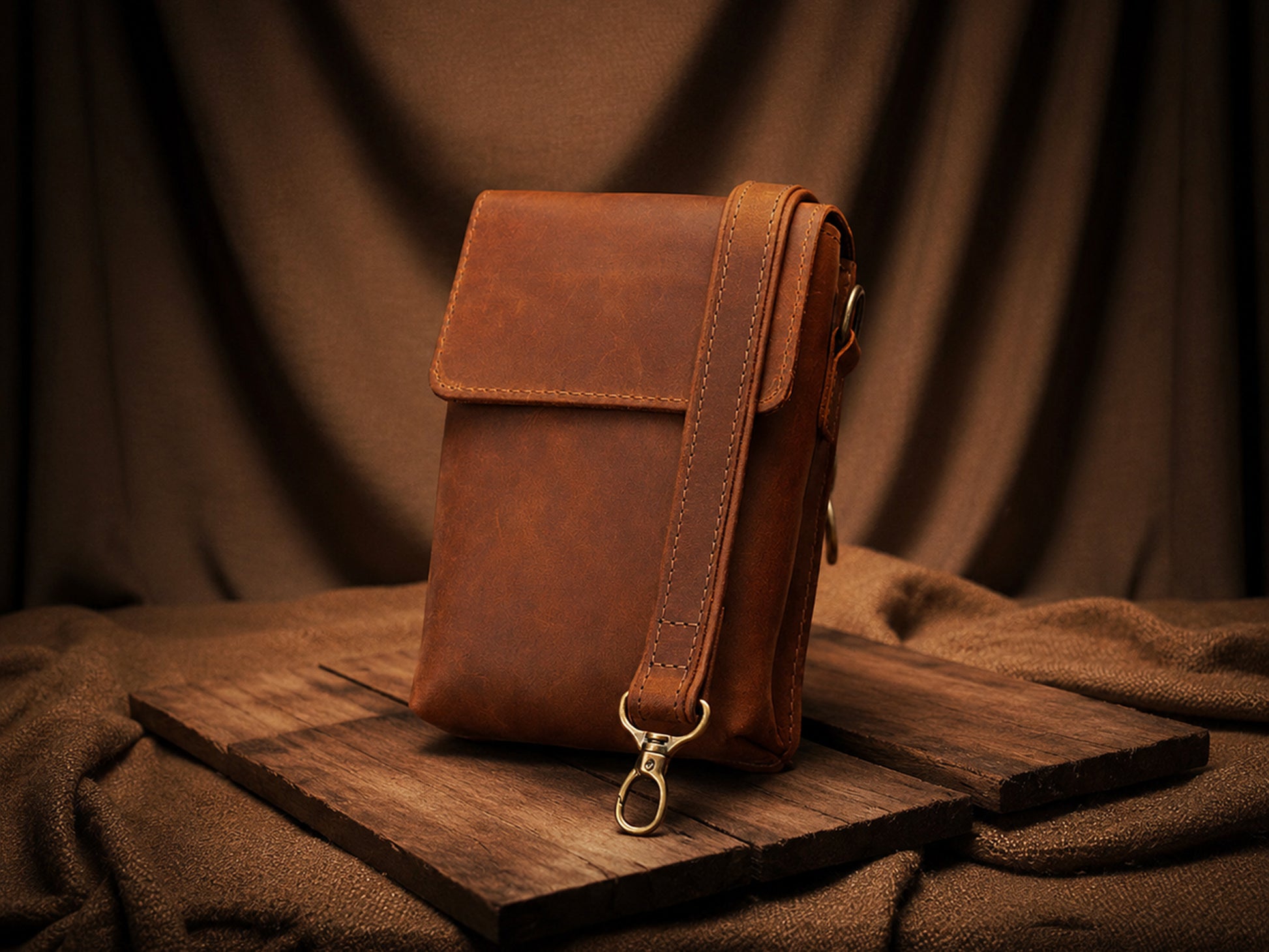 Leather crossbody bag zipper and closure detail, durable brass hardware