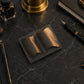 The Scribe leather pen loop open, showing pen storage compartment