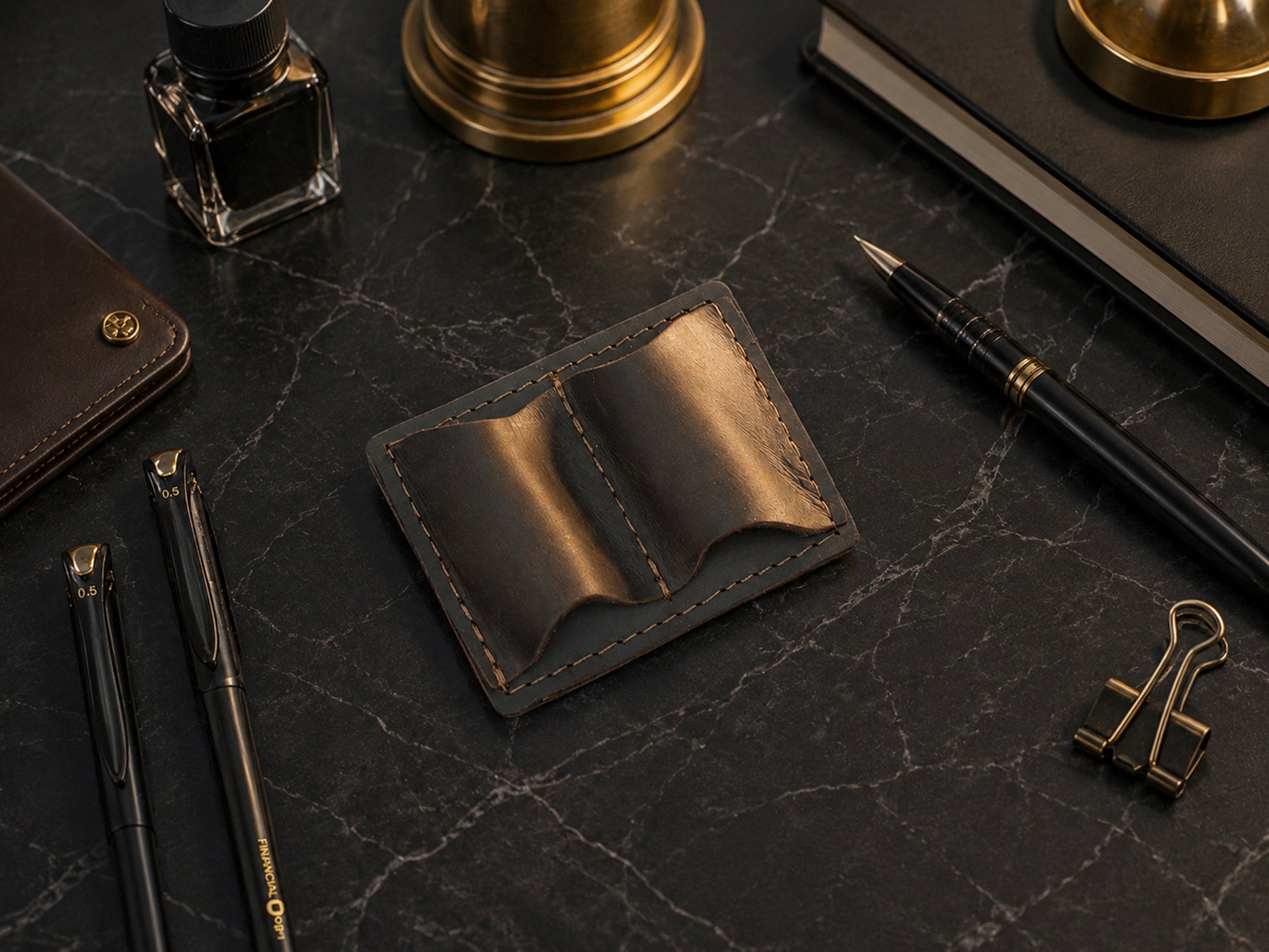 The Scribe leather pen loop open, showing pen storage compartment