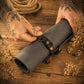 Interior of leather knife roll, individual blade slots and secure storage