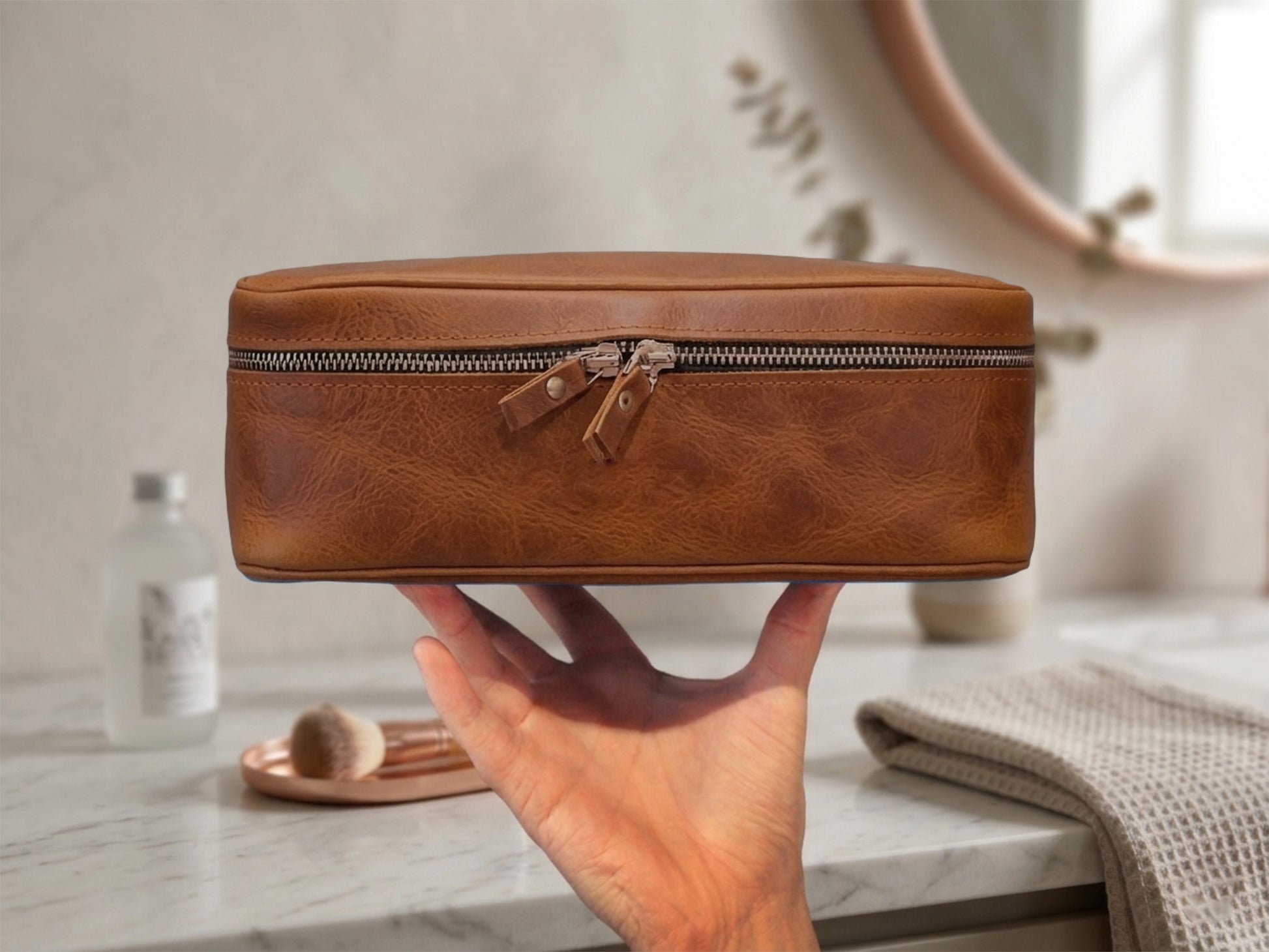 Interior of leather lingerie pouch, soft compartments for delicate garments