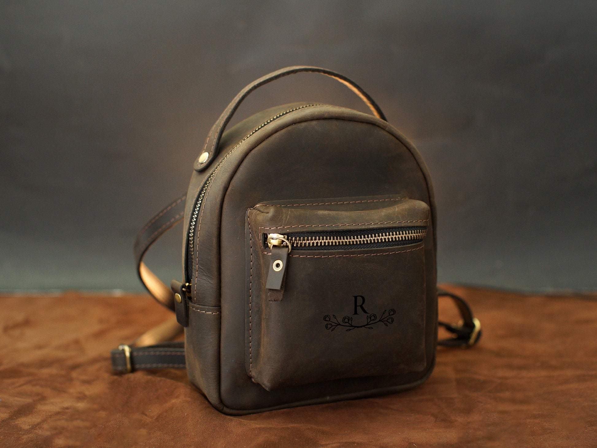 Premium leather mini backpack with name stamp, warm earthy tone