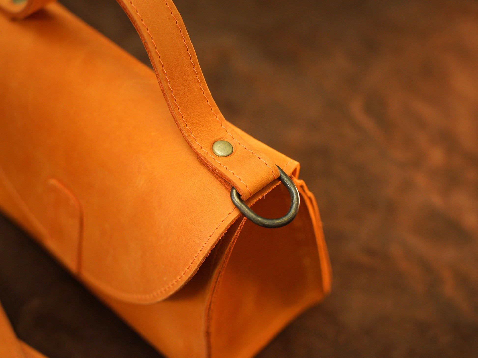 Interior of leather handbag, structured compartments for daily essentials