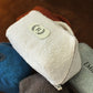 Personalized monogram embroidery on handcrafted sherpa toiletry bag