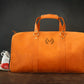 Personalized monogram engraving on handcrafted leather weekender bag