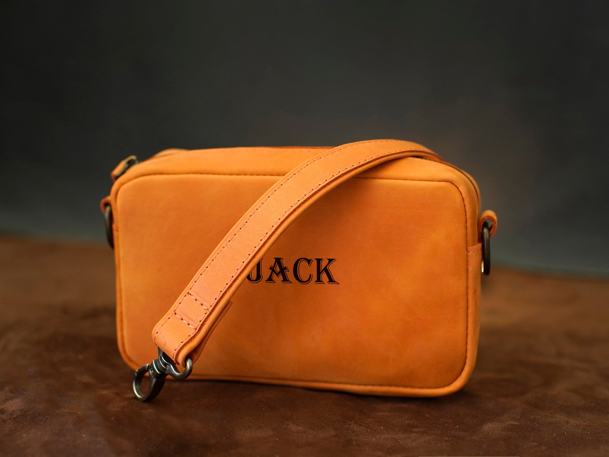 Premium leather crossbody bag with name stamp, warm earthy tone