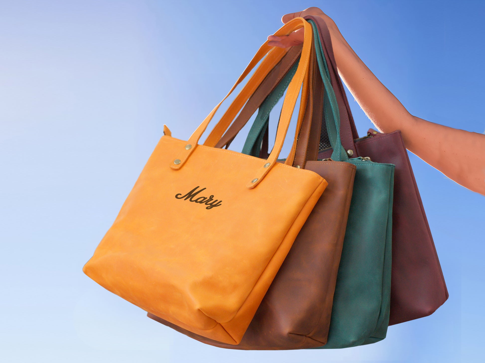 Interior of leather tote bag, spacious zippered compartment