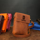 Personalized vertical leather crossbody bag, back view with strap detail