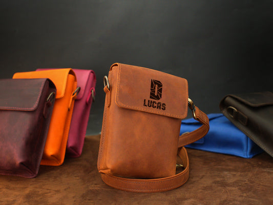 Personalized vertical leather crossbody bag, back view with strap detail