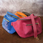 Leather sling bag with custom stamp, compact everyday mobility
