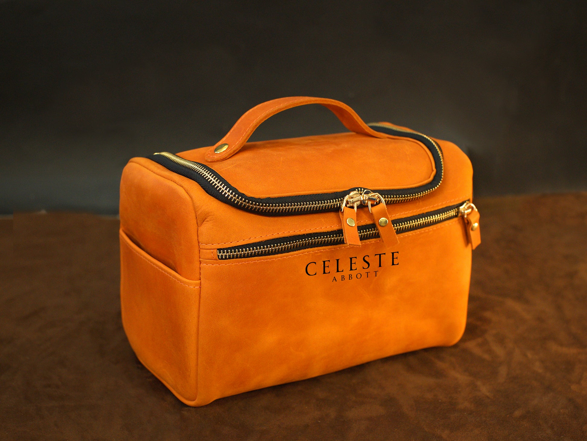 Large leather toiletry bag with custom stamp, warm brown leather