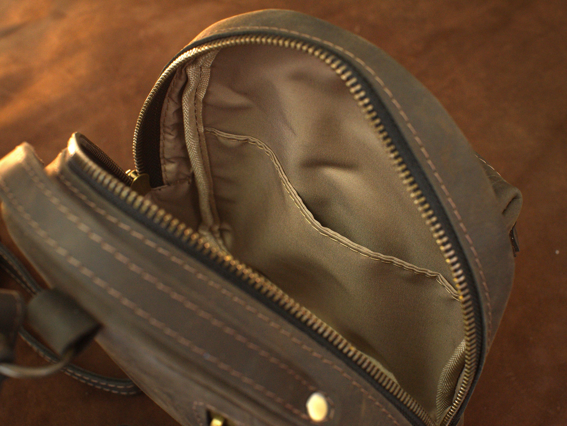 Close-up of leather mini backpack zipper and hardware detail