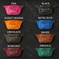 Collection of crossbody packs in various colors on a textured black background