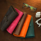 Leather cable organizer with custom monogram, compact travel tech case
