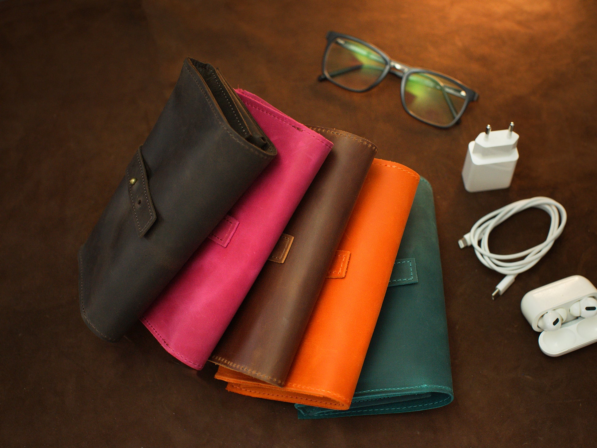 Leather cable organizer with custom monogram, compact travel tech case