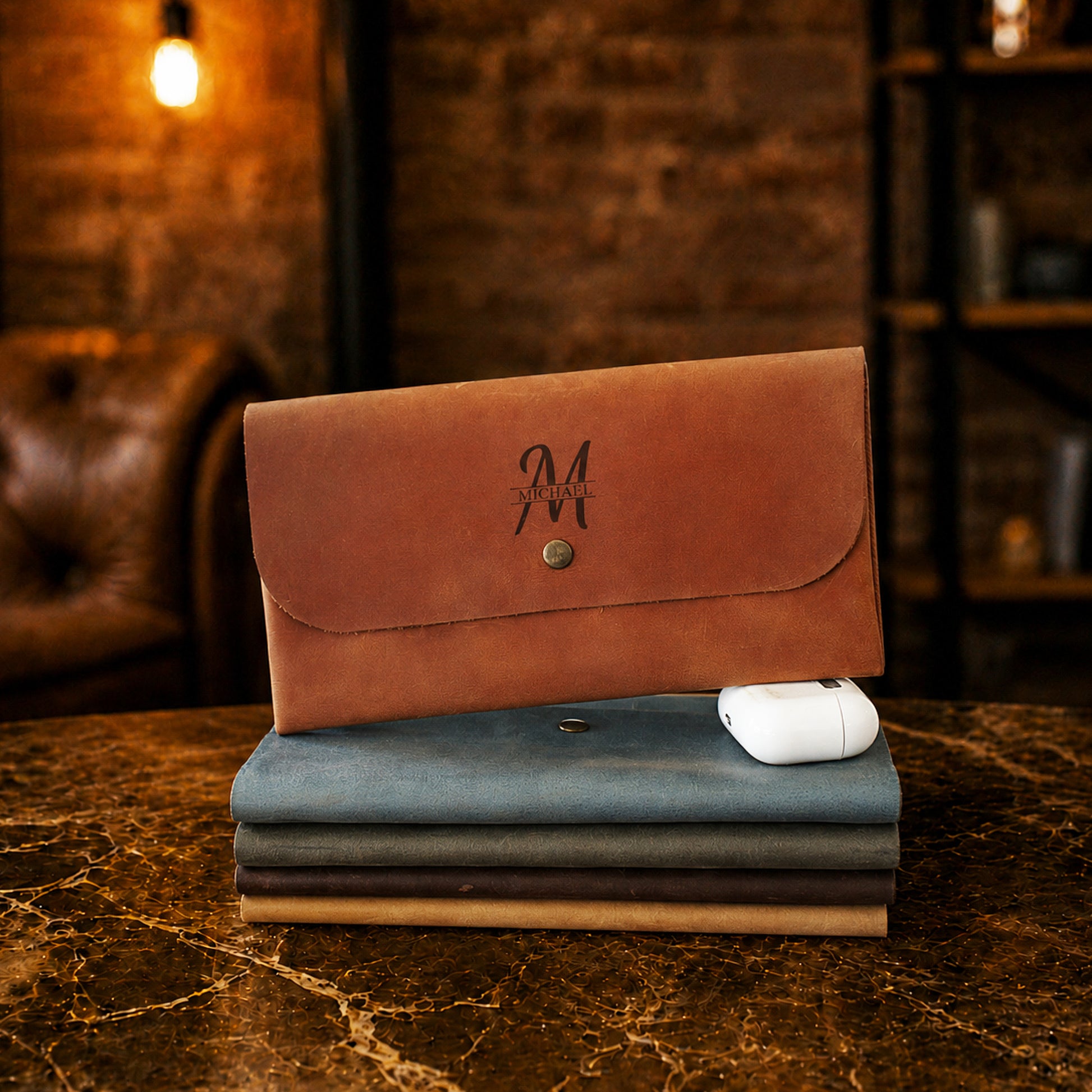 Person carrying personalized leather clutch, lifestyle editorial photo