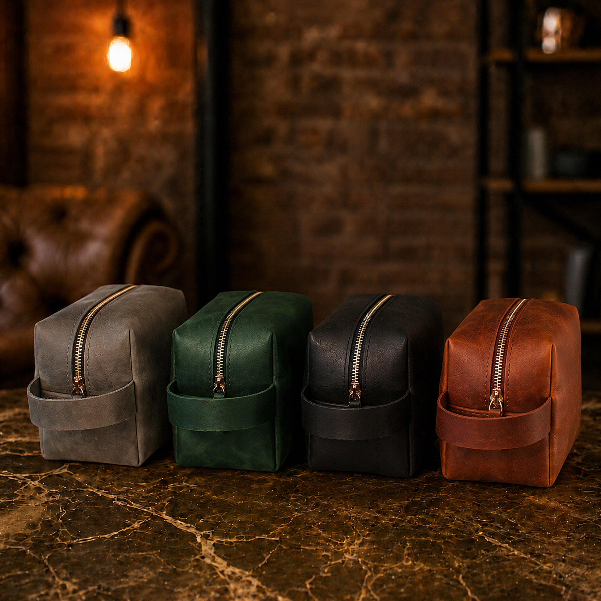 Brown leather small dopp kit with custom monogram engraving, front view