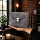 Leather cosmetic bag interior pockets detail, multi-compartment organizer