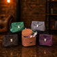 The Petite Luxe leather bag in use outdoors, warm earthy tones