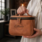 Minimalist leather toiletry bag with vertical design, handcrafted