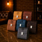 Personalized leather dopp kit with monogram, flat lay on dark surface