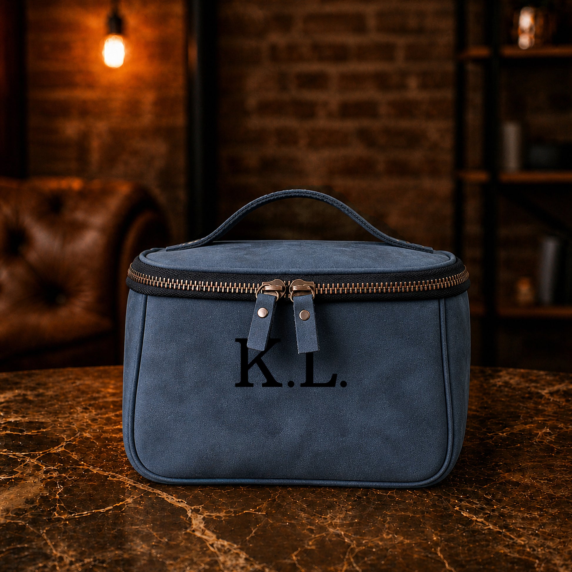 Close-up of leather toiletry bag zipper and hardware detail