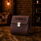 Close-up of leather dopp kit clasp and hardware detail