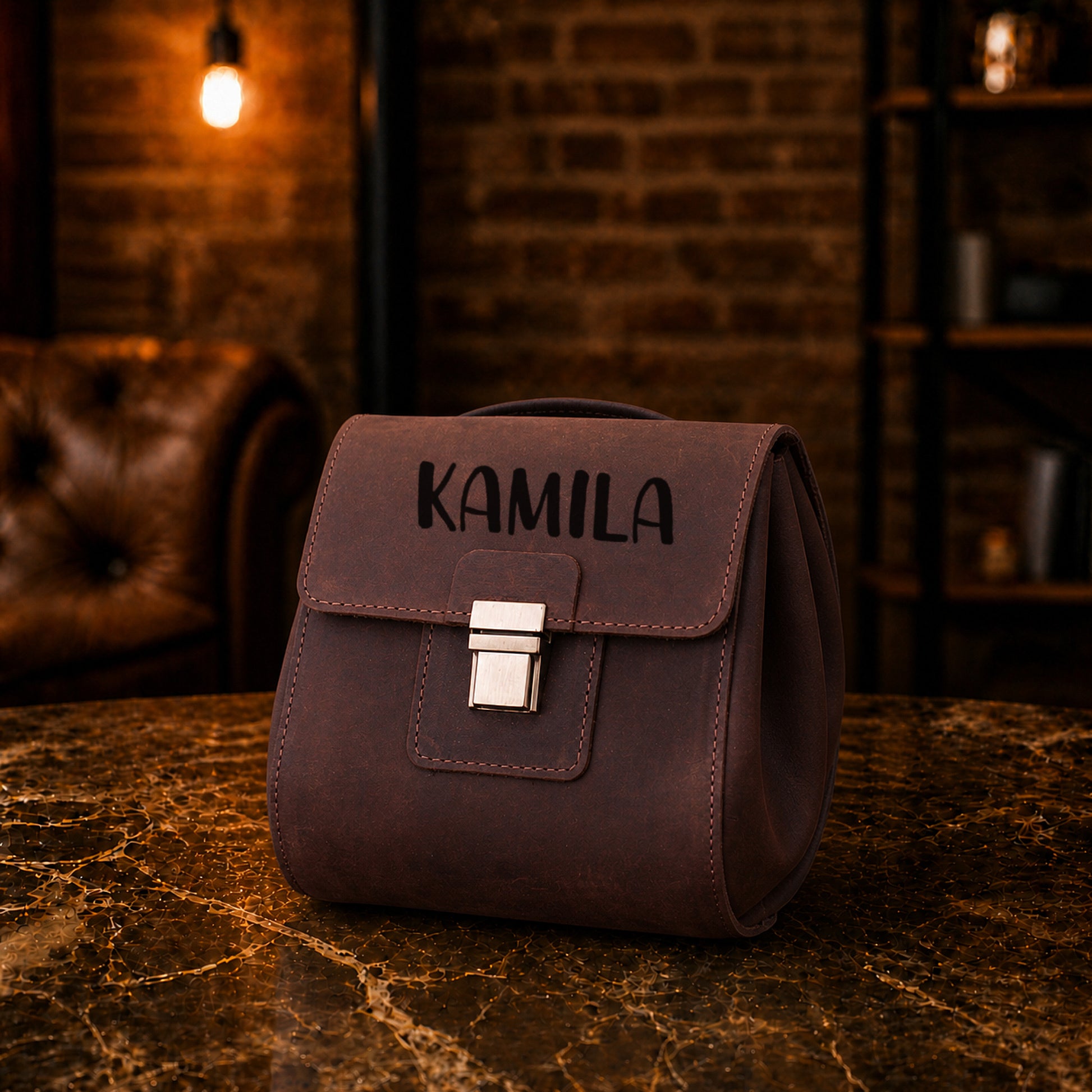 Close-up of leather dopp kit clasp and hardware detail