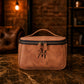 Natural leather toiletry bag with warm patina, artisan craftsmanship