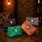 Interior of leather vanity case, organized compartments for cosmetics