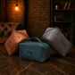 Leather cosmetic bag interior pockets detail, multi-compartment organizer