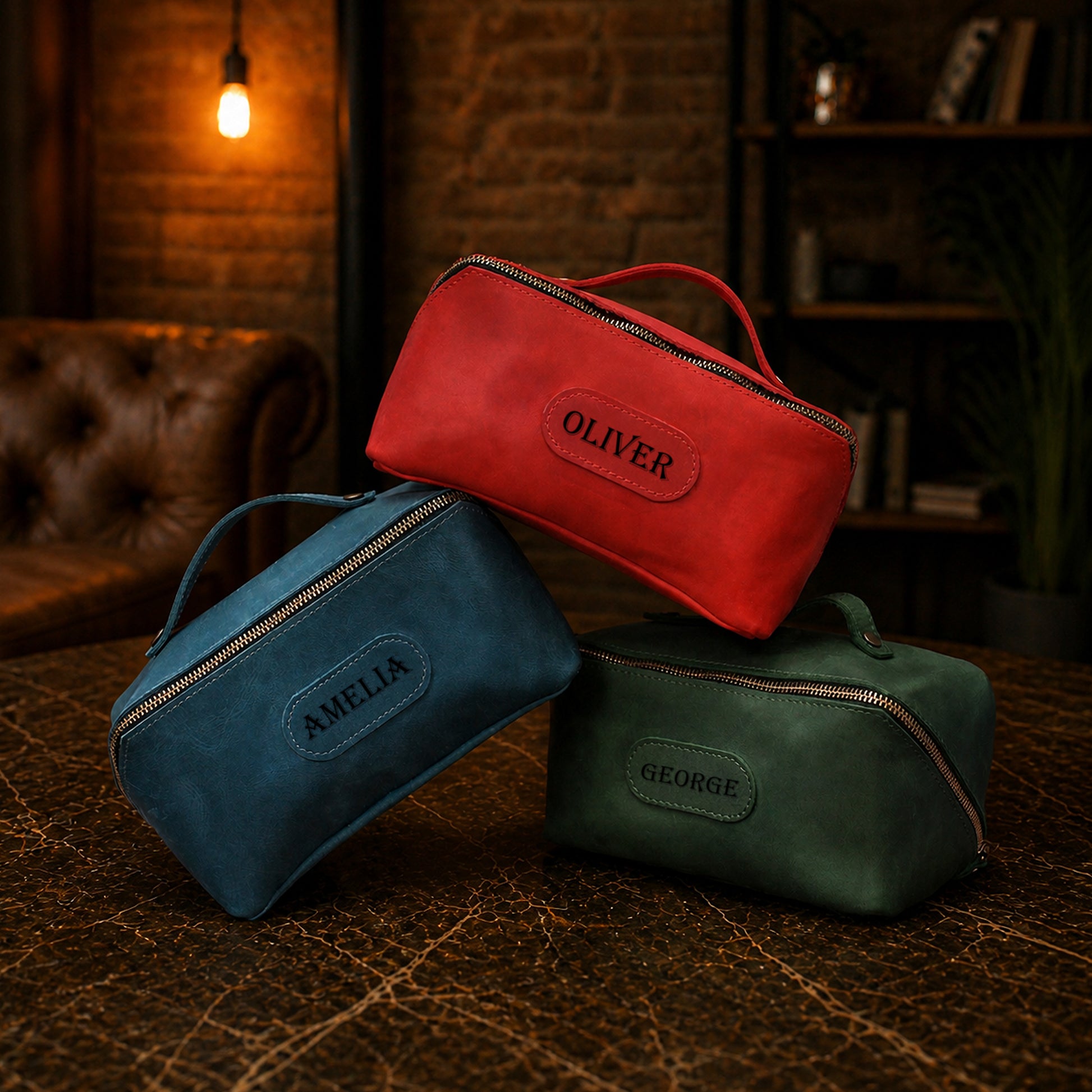 Collection of leather cosmetic bags with monogram initials, various colors