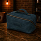 Minimalist leather makeup bag with adjustable zipper, handcrafted design