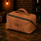 Personalized monogram engraving on handcrafted leather cosmetic bag