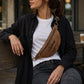 Leather fanny pack collection with personalized engravings, various colors