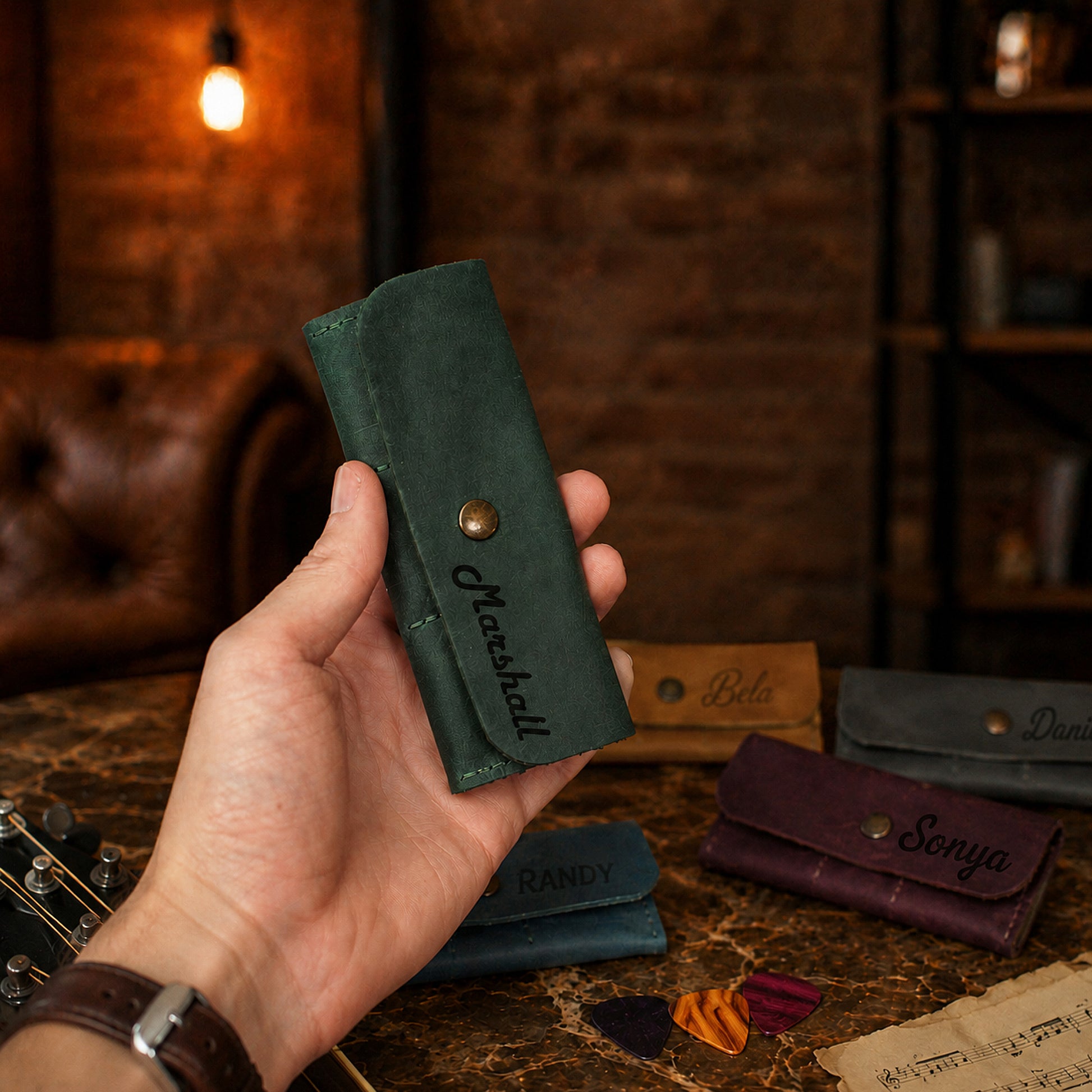 Leather pick holder with custom name engraving, warm brown tone