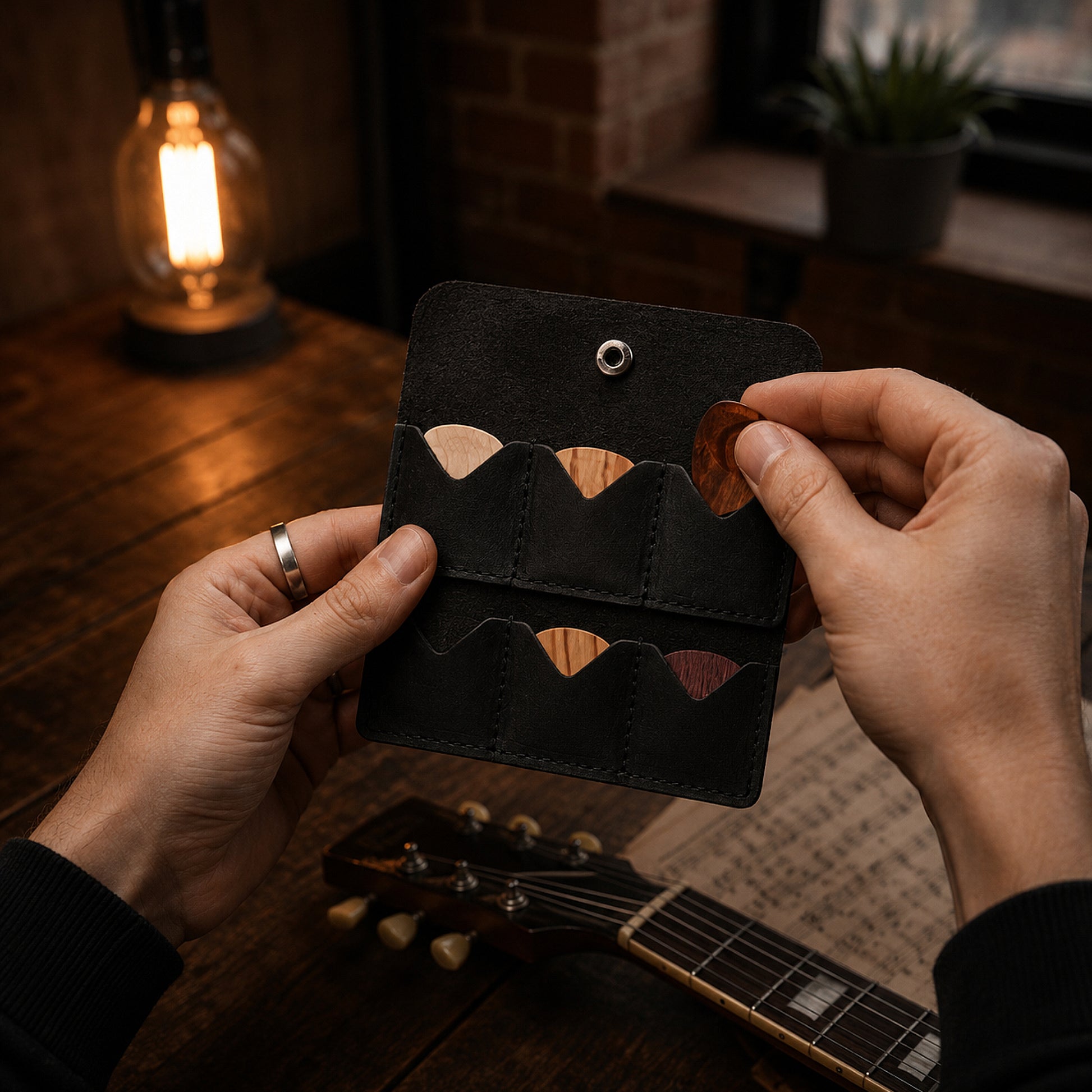 Interior of leather guitar pick holder, secure pocket for picks