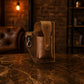 Brown leather utility pouch with custom monogram engraving, front view