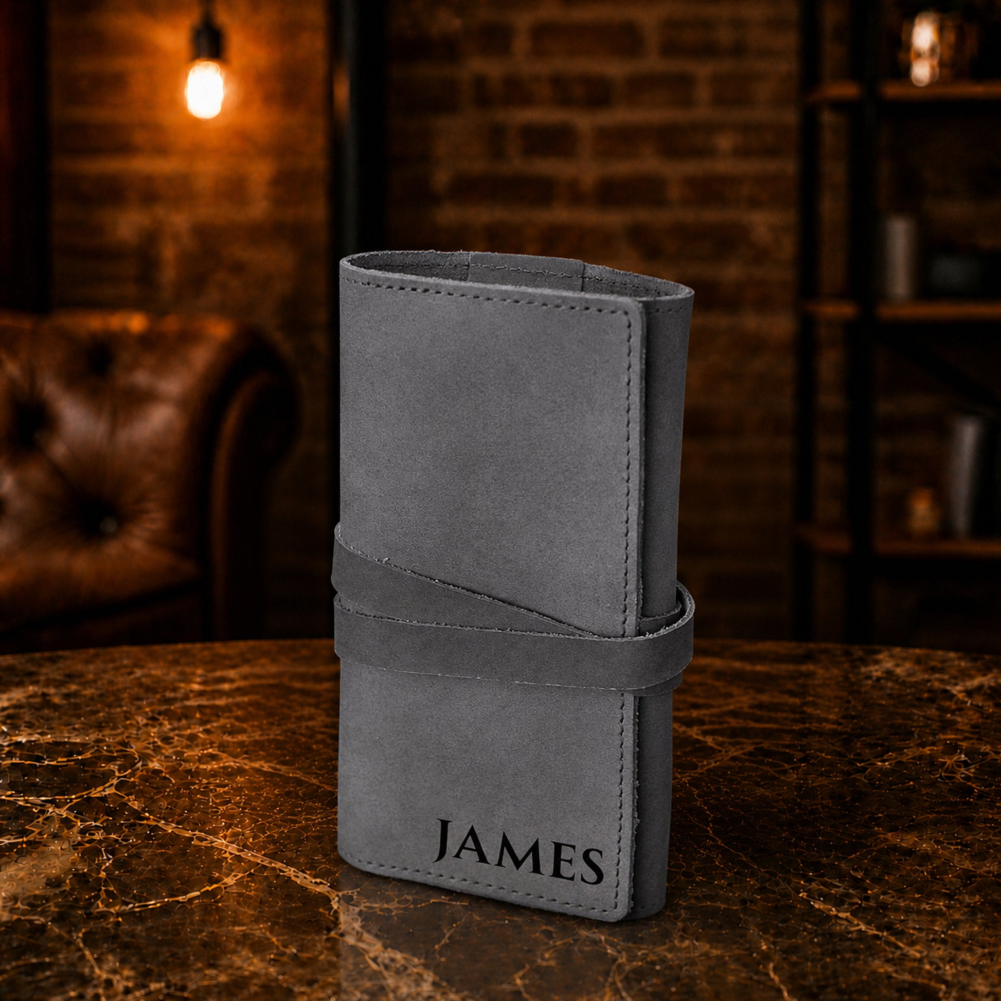 Leather travel cord organizer with clasp closure, durable brass hardware