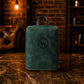 Person carrying personalized leather shoe bag, lifestyle editorial photo