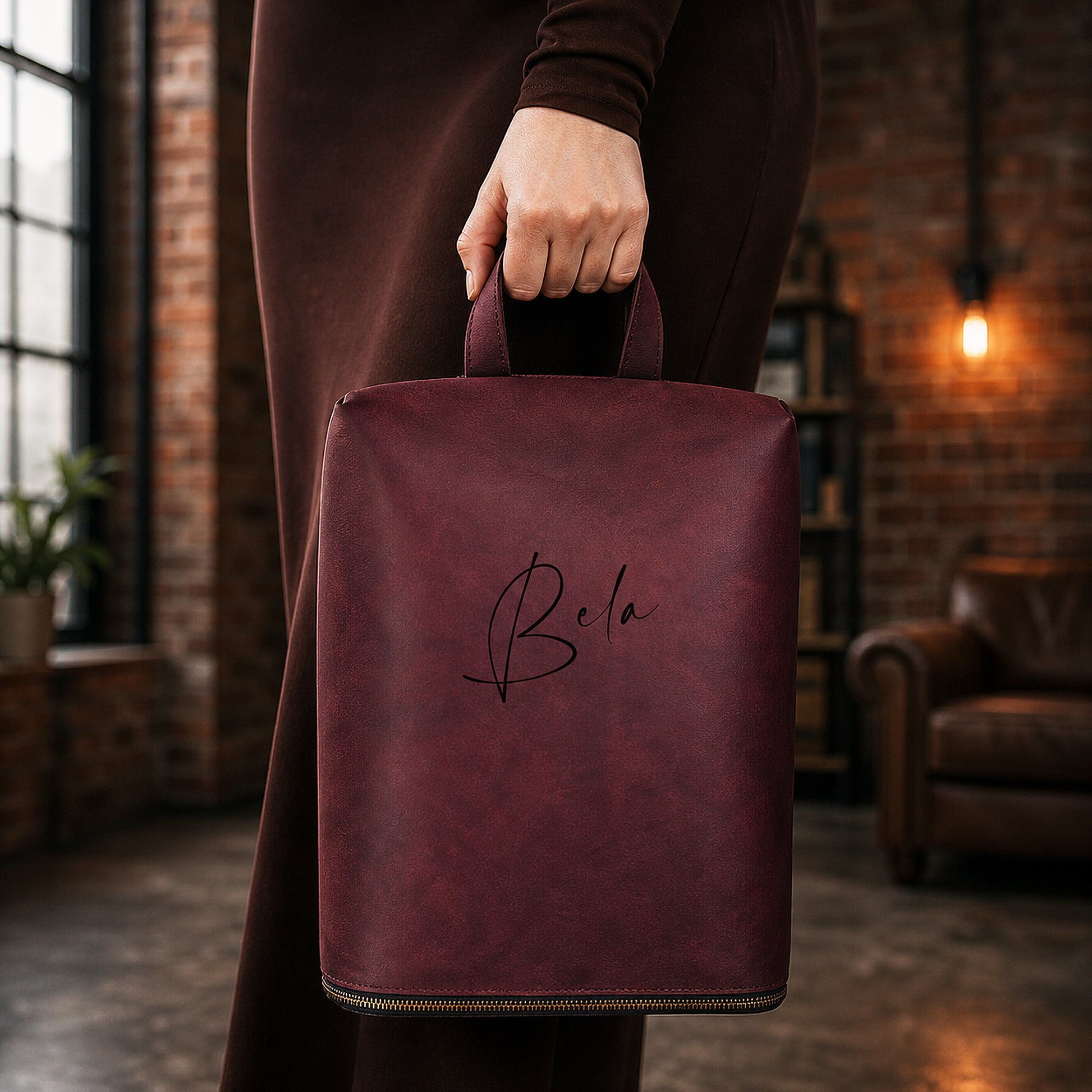 Brown leather shoe bag with custom monogram engraving, front view