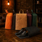 Personalized monogram engraving on handcrafted leather shoe bag