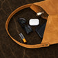 Natural leather tote bag with warm patina, artisan craftsmanship