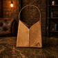 Minimalist leather tote bag with adjustable strap, handcrafted design
