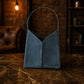 The Artisan Slouch leather handbag, side profile view